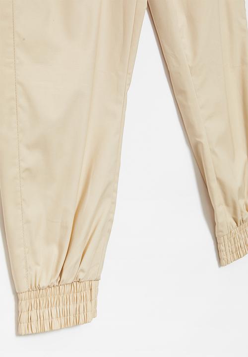 PUMA - Za boys chino pants - light sand