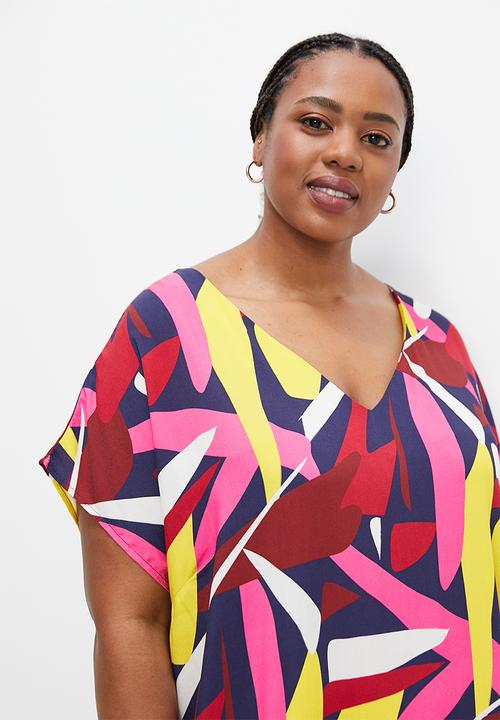 edit Plus - V-neck curved hem tunic - bold abstract leaves