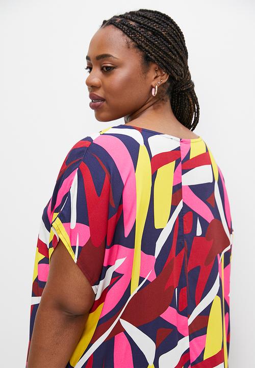 edit Plus - V-neck curved hem tunic - bold abstract leaves