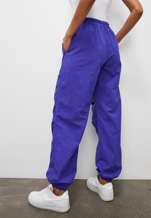 Blake - Parachute trousers - blue