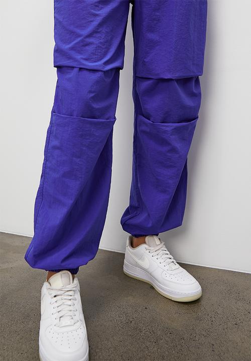 Blake - Parachute trousers - blue