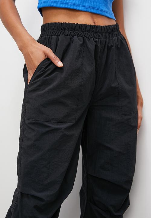 Blake - Parachute trousers - black