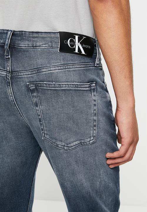 Calvin Klein - Slim taper - dark wash