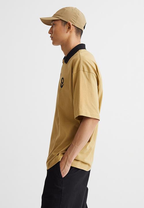 H&M - Oversized fit cotton polo shirt - mustard yellow/flower 