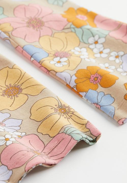 H&M - Flared leggings - beige/floral
