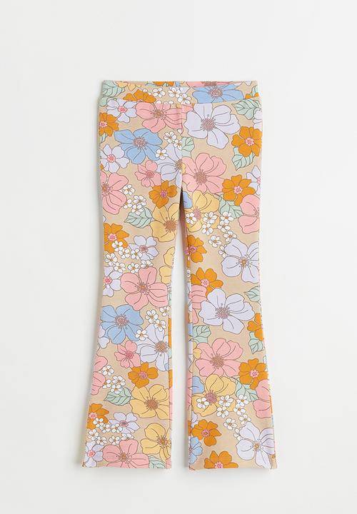 H&M - Flared leggings - beige/floral