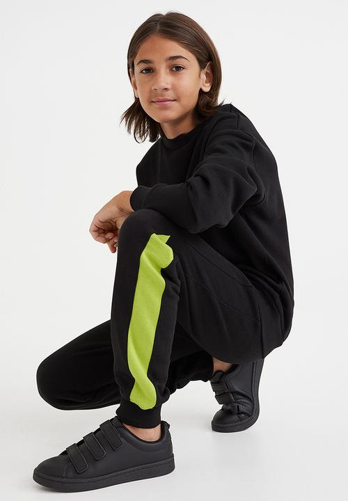 H&M - Sweatpants - black/neon green