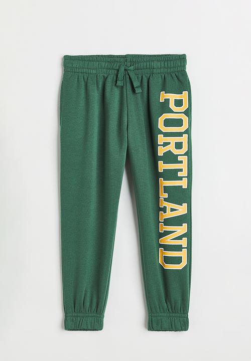 H&M - Printed joggers - green/portland