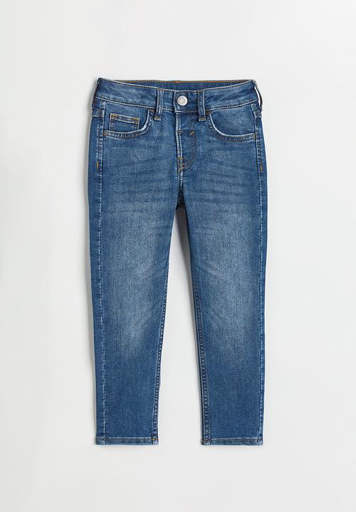 H&M - Superstretch relaxed tapered fit jeans - denim blue