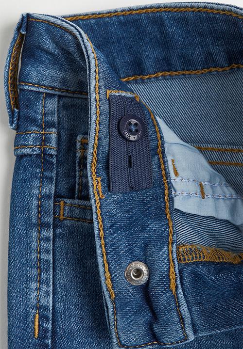 H&M - Superstretch relaxed tapered fit jeans - denim blue
