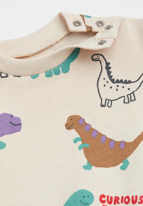 H&M - Cotton sweatshirt - light beige/dinosaurs