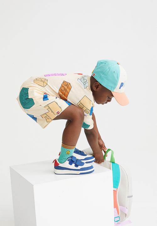 H&M - Patterned sweatshorts - light yellow/lego® collection