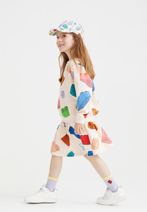 H&M - Printed sweatshirt skirt - light yellow/lego® collection