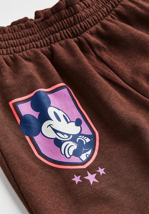 H&M - Printed joggers - dark brown/mickey mouse
