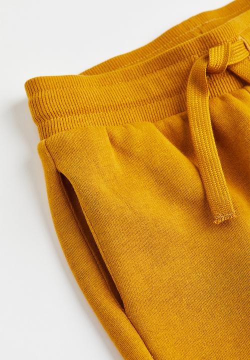 H&M - Brushed-inside joggers - dark yellow