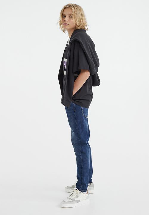 H&M - Relaxed tapered fit jeans - dark denim blue