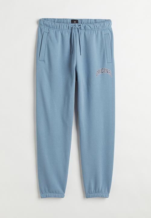 H&M - Regular fit printed sweatpants - light blue/original