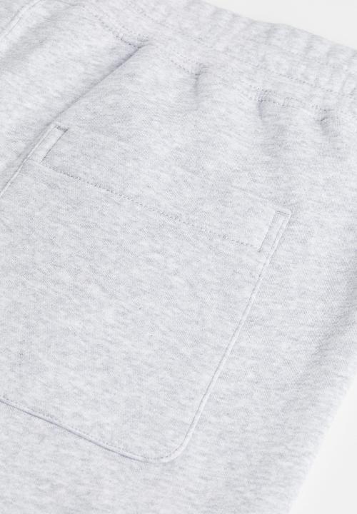 H&M - Relaxed fit sweatpants - light grey marl/low-key land