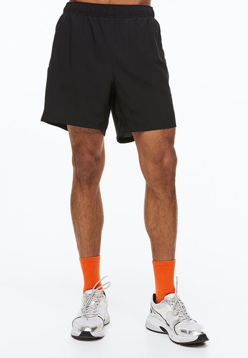 H&M - Fast-drying sports shorts - black