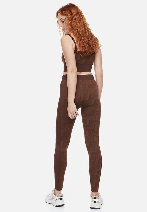 H&M - Seamless sports tights - dark brown/patterned