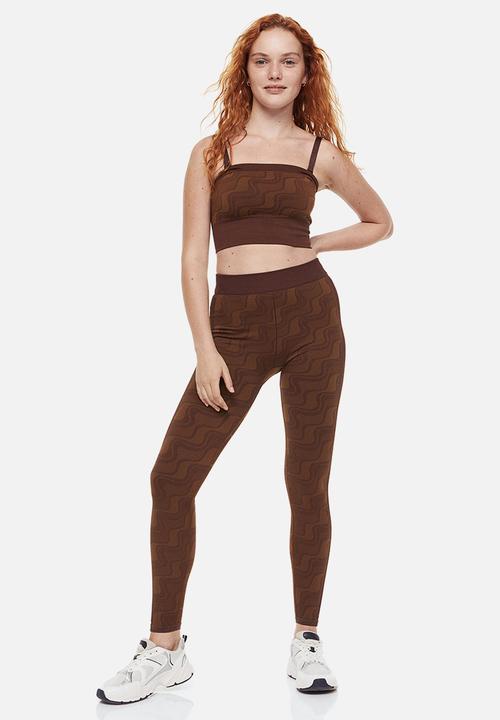 H&M - Seamless sports tights - dark brown/patterned