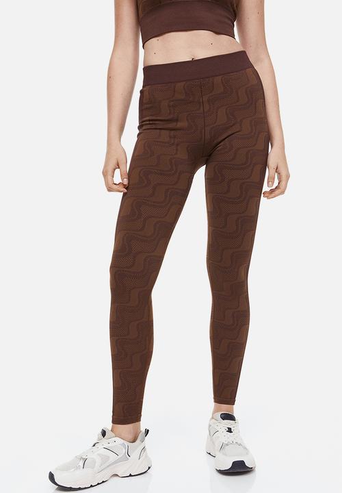 H&M - Seamless sports tights - dark brown/patterned