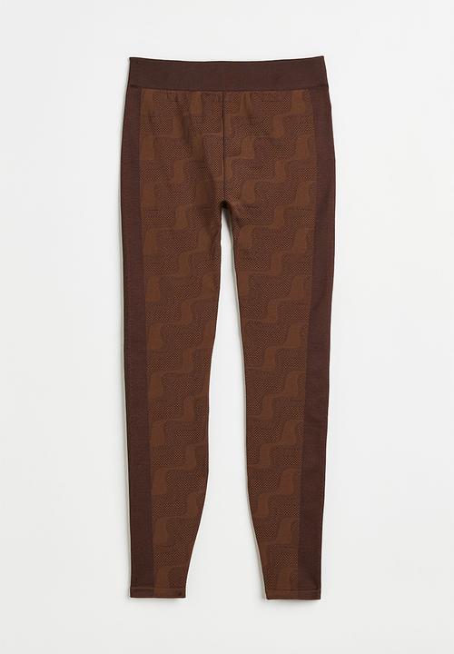 H&M - Seamless sports tights - dark brown/patterned
