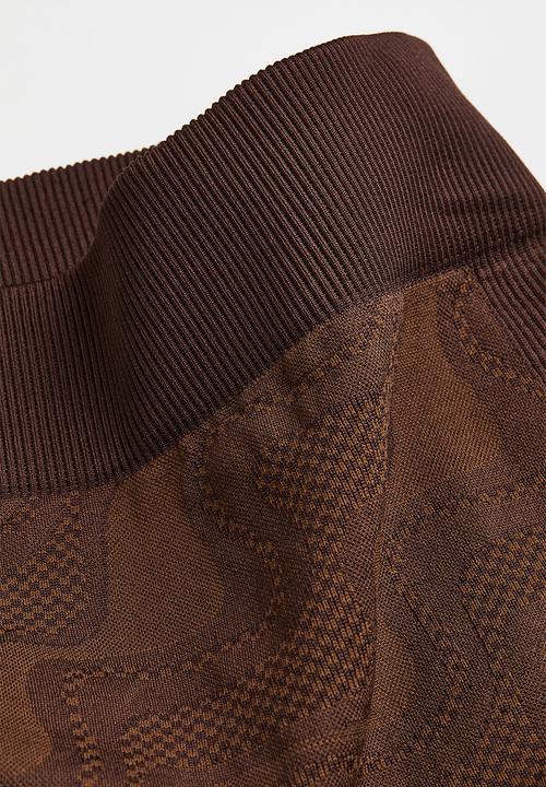 H&M - Seamless sports tights - dark brown/patterned
