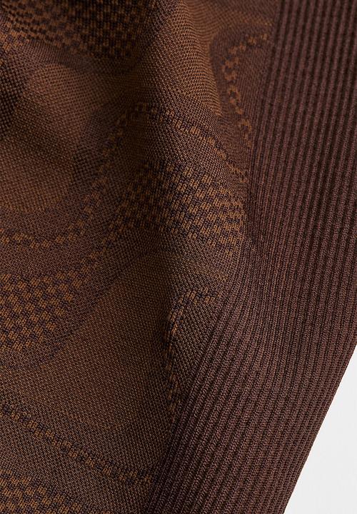 H&M - Seamless sports tights - dark brown/patterned