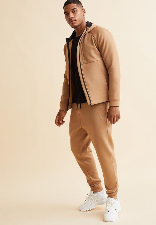 H&M - Fast-drying track pants - beige