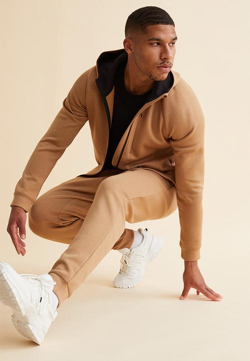 H&M - Fast-drying track pants - beige