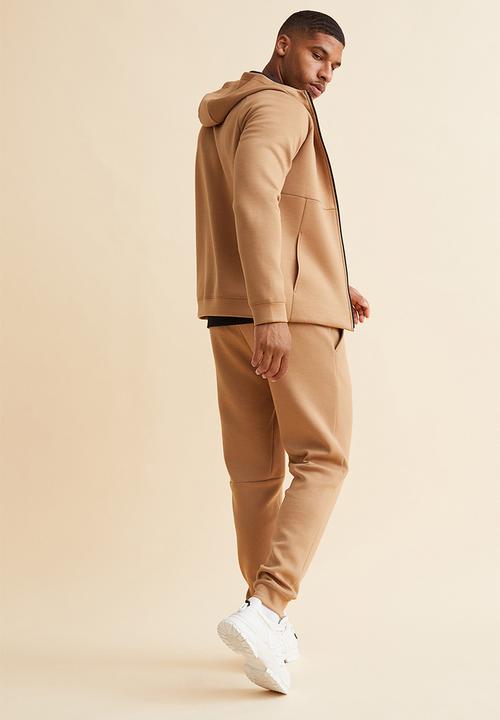 H&M - Fast-drying track pants - beige