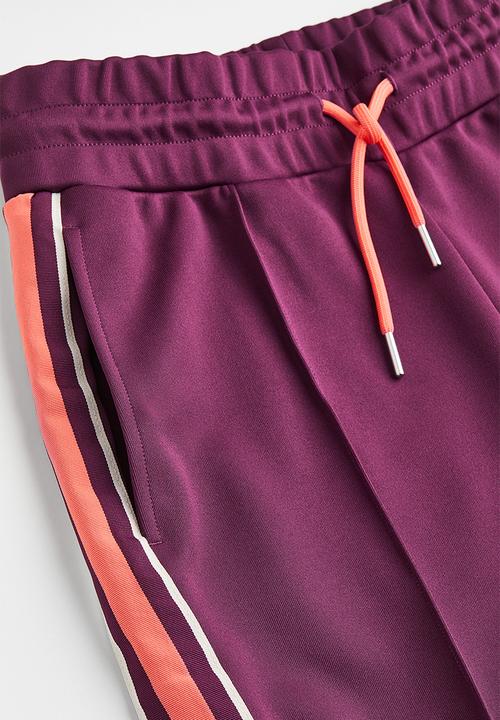 H&M - Track pants with side stripes - plum purple