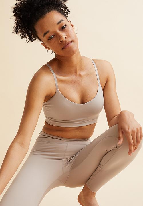 H&M - Light support sports bra in softmove™ - light beige