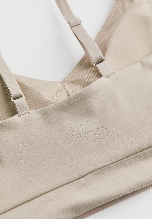 H&M - Light support sports bra in softmove™ - light beige