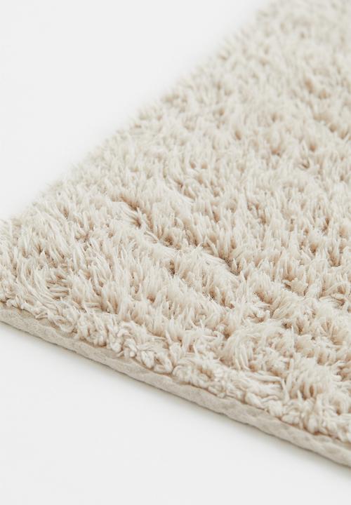 H&M - Tufted bath mat - beige