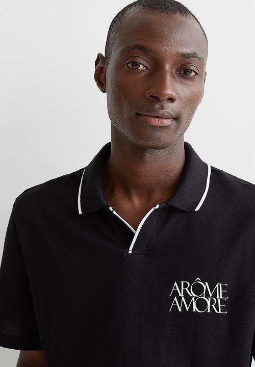 H&M - Regular fit polo shirt - black/arôme