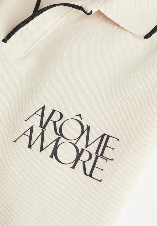 H&M - Regular fit polo shirt - cream/arôme