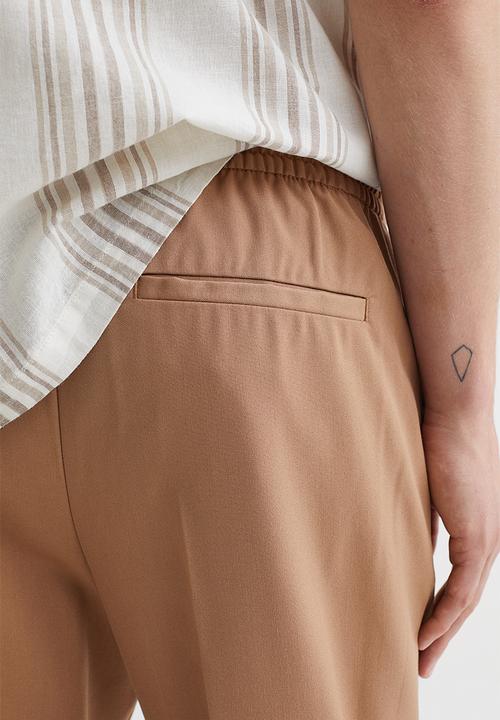 H&M - Slim fit joggers - beige