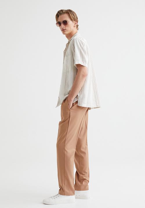 H&M - Slim fit joggers - beige