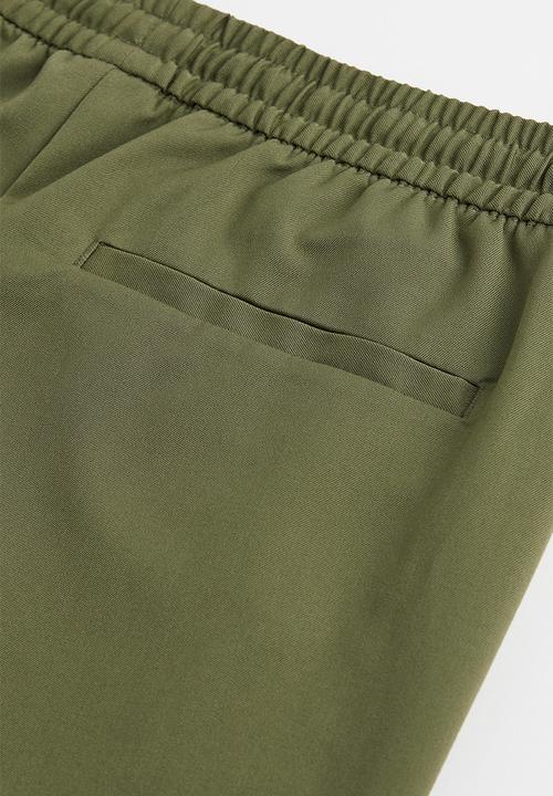 H&M - Slim fit joggers - khaki green