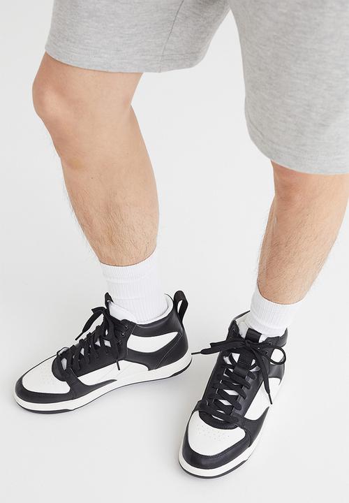 H&M - Hi-top trainers - black/white