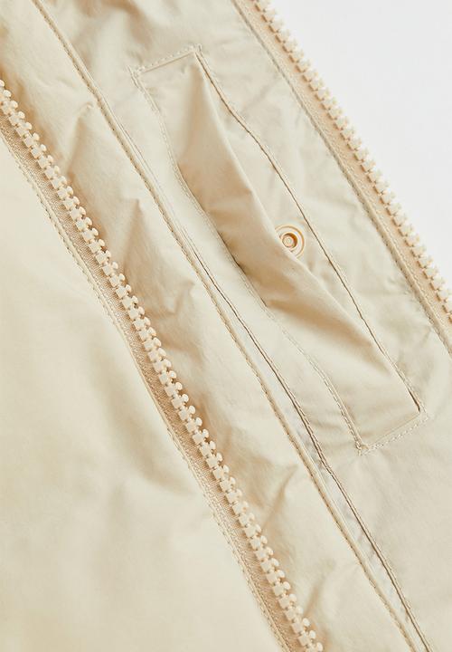 H&M - Water-repellent puffer gilet - light beige