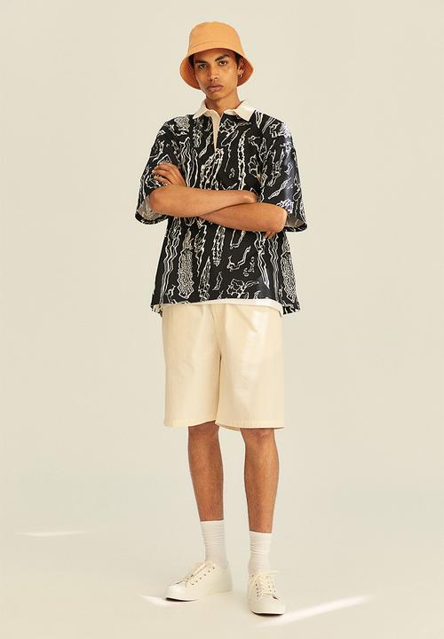 H&M - Oversized fit short sleeved rugby shirt - black/multi