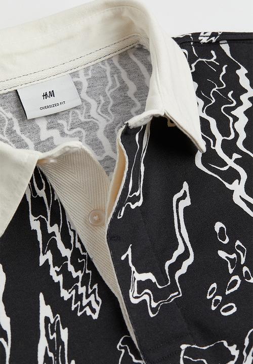 H&M - Oversized fit short sleeved rugby shirt - black/multi