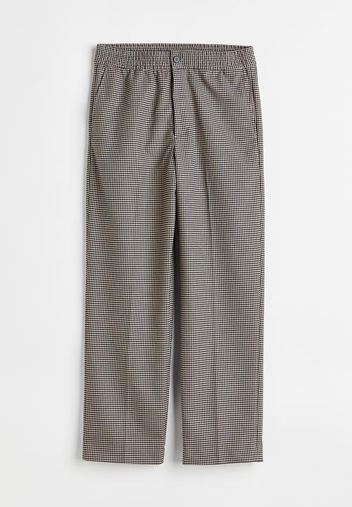 H&M - Relaxed fit suit trousers - light beige/dogtooth patterned
