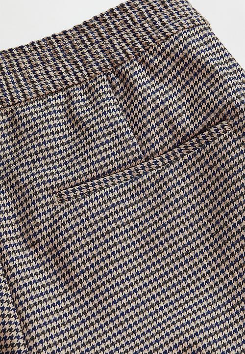 H&M - Relaxed fit suit trousers - light beige/dogtooth patterned