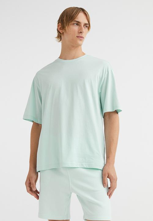 H&M - Regular fit sweatshirt shorts - light turquoise