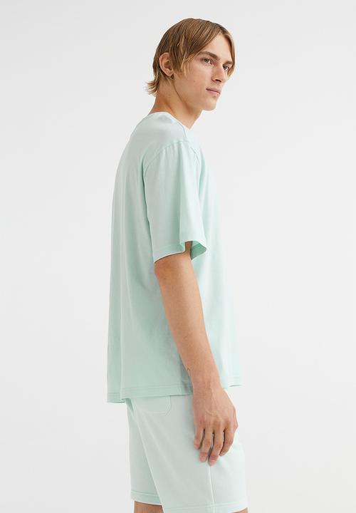 H&M - Regular fit sweatshirt shorts - light turquoise