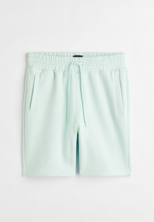 H&M - Regular fit sweatshirt shorts - light turquoise